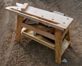 The bench's small size will allow it to pack easily into the truck, even holding items in the tills.